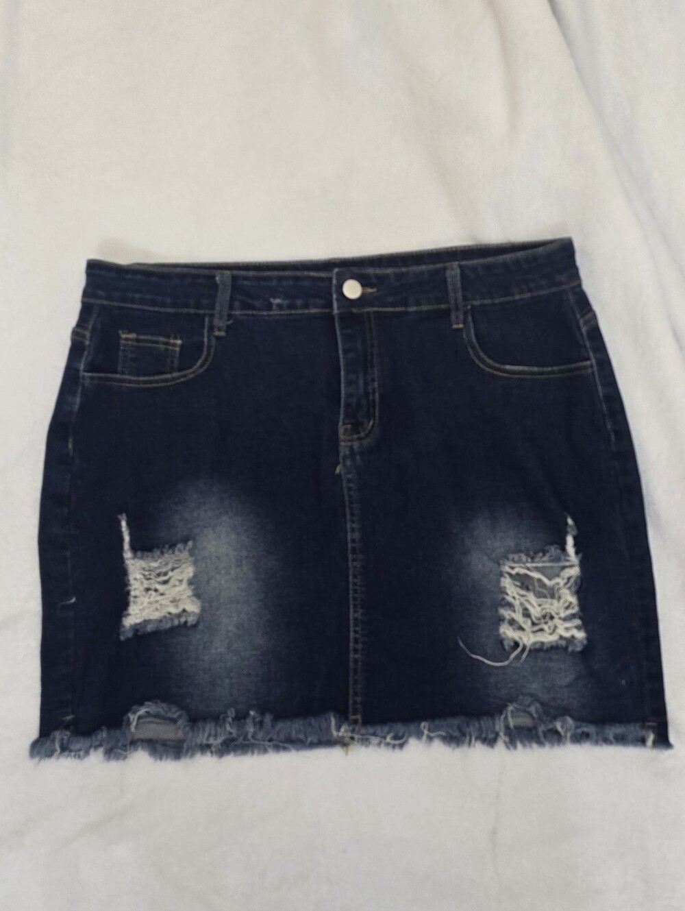 SHEIN dark blue distressed denim mini skirt